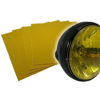 Sticker vinyle jaune transparent pour phare moto (25x25cm)